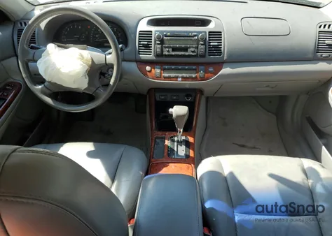 2004 Toyota Camry Le from USA, damaged, VIN 4T1BF30K14U579715